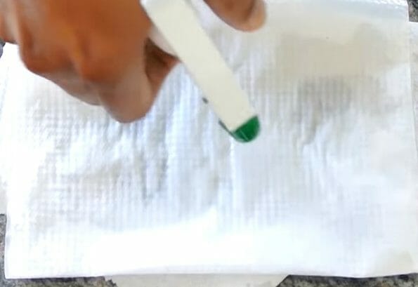 Soak the paper using water spray
